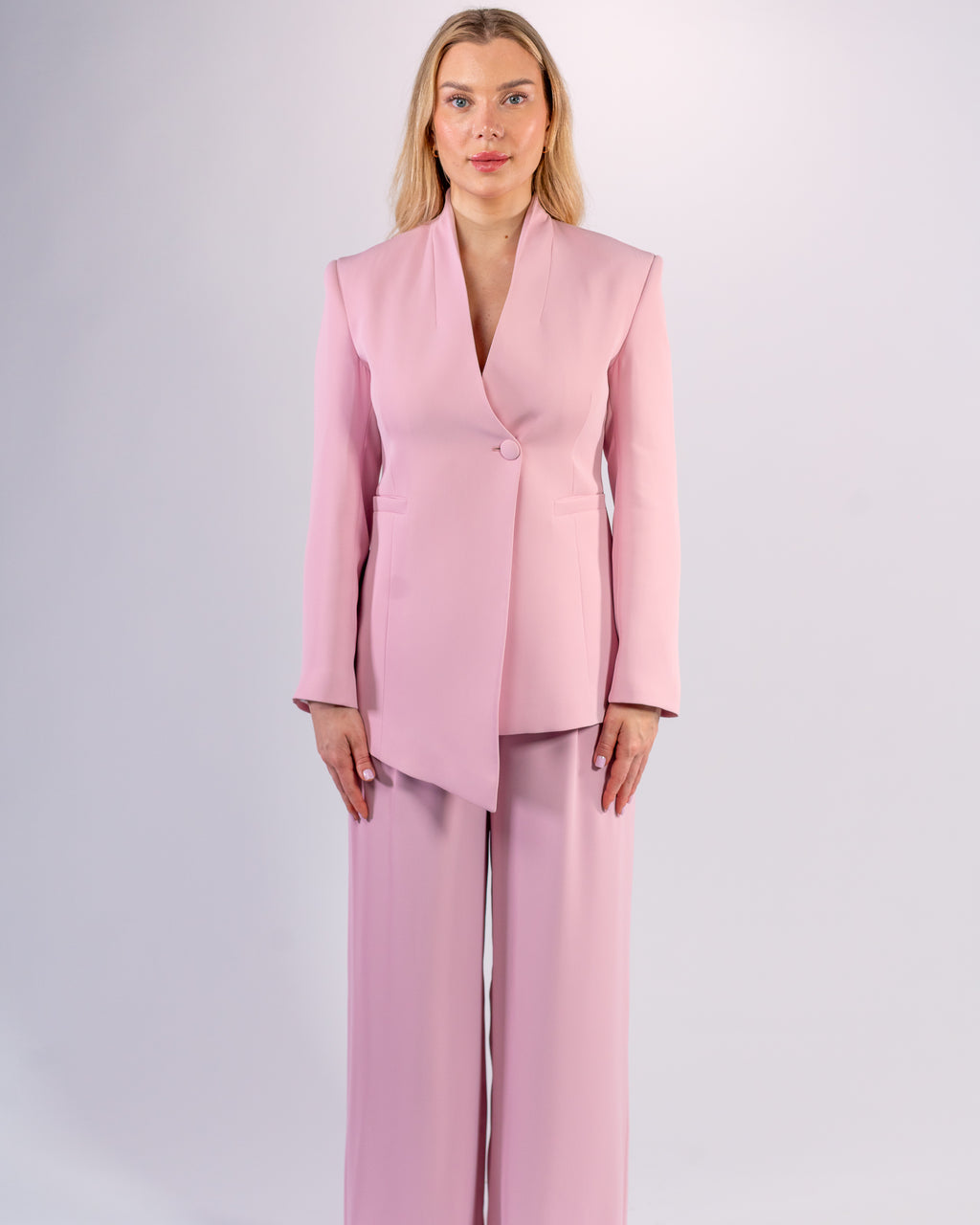 Shawl-collar, single-button, and palazzo-cut suit in Pink