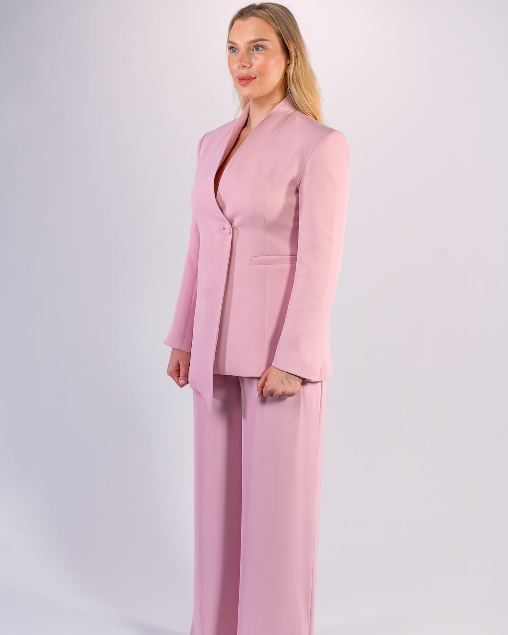Shawl-collar, single-button, and palazzo-cut suit in Pink