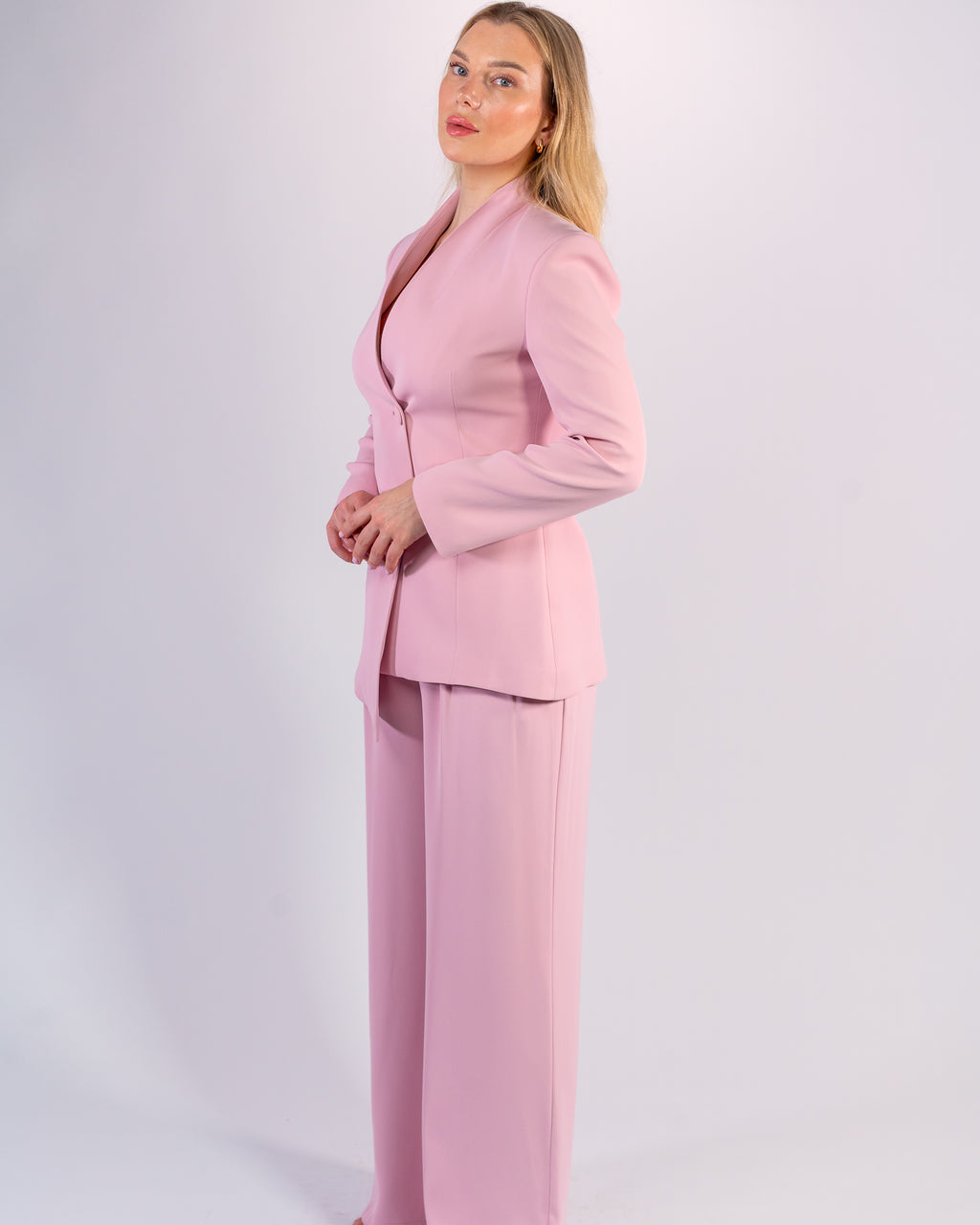 Shawl-collar, single-button, and palazzo-cut suit in Pink