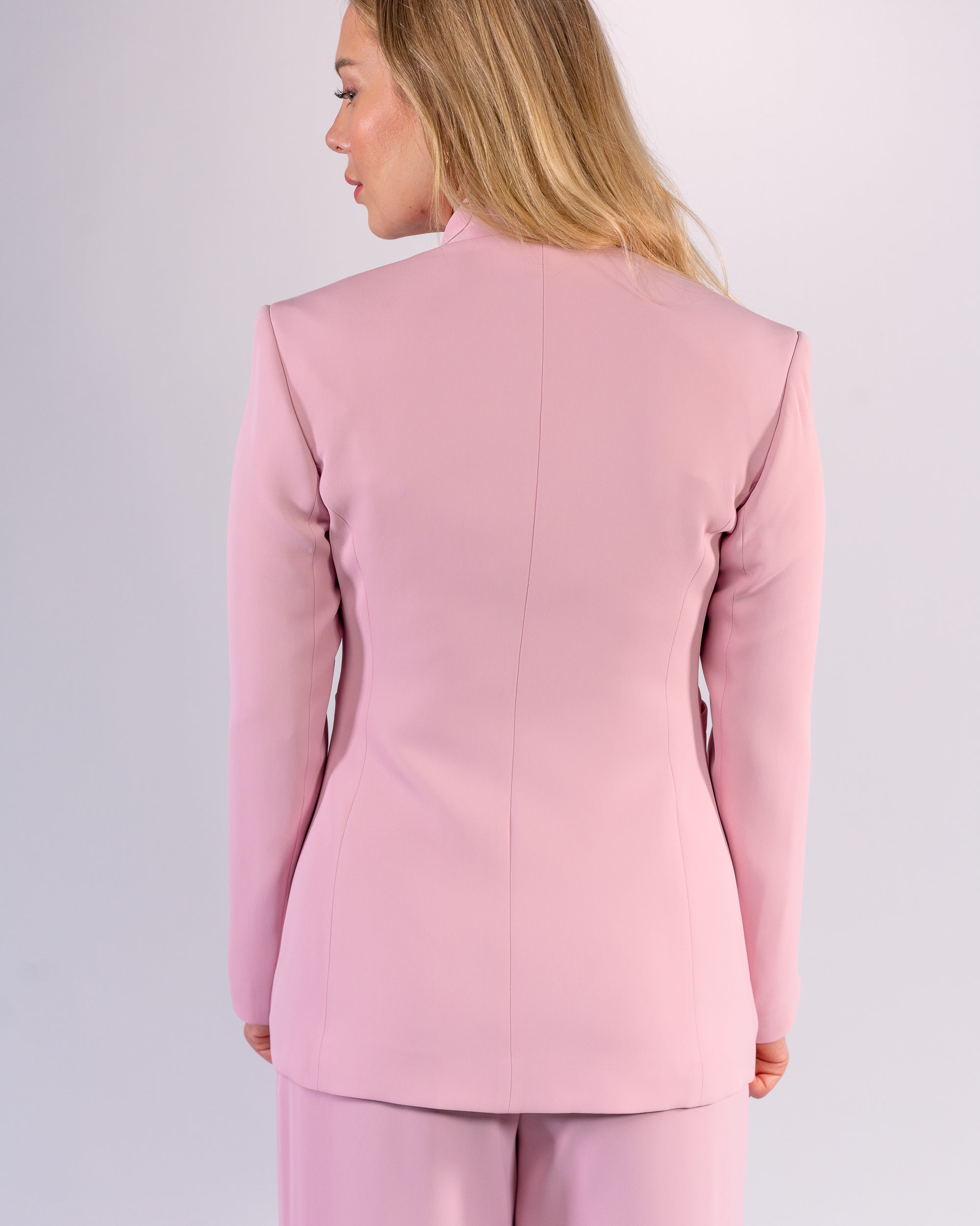 Shawl-collar, single-button, and palazzo-cut suit in Pink