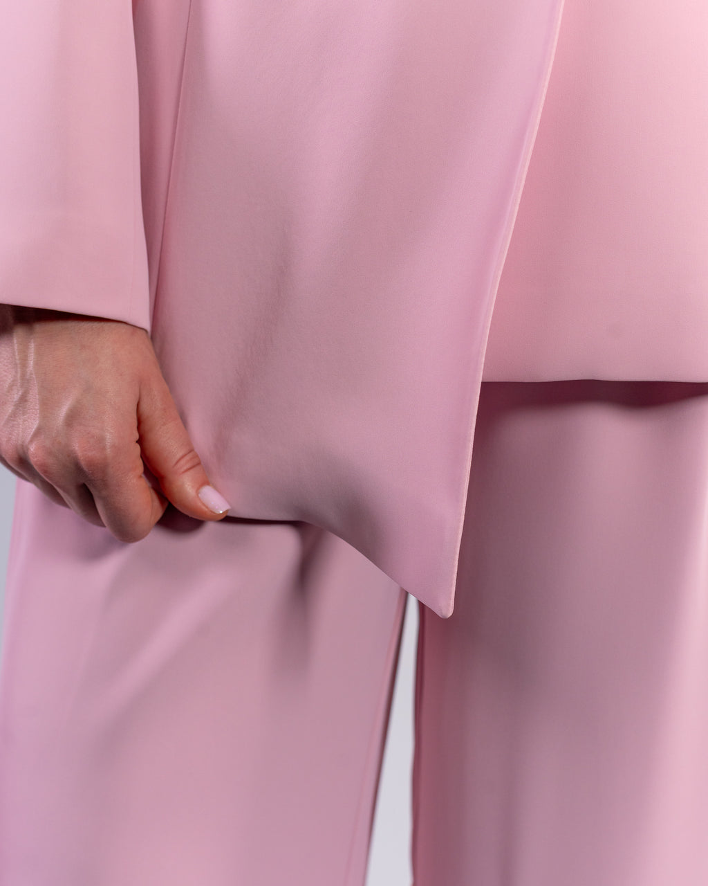 Shawl-collar, single-button, and palazzo-cut suit in Pink